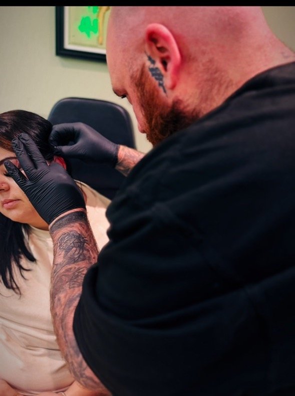 Professional needle-only piercing at The Viper Pit